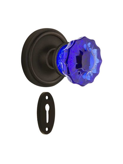 Classic Rosette Mortise Lock Set with Colored Fluted Crystal Glass Knobs Cobalt Blue in Oil-Rubbed Bronze.